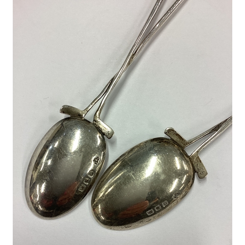 553 - OF GOLFING INTEREST: A pair of rare novelty silver spoons with Royal crest to centre. London 1929. A... 