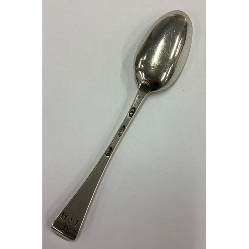 558 - An 18th Century silver picture back spoon chased with hearts and flowers. Circa 1770. Approx. 9 gram... 