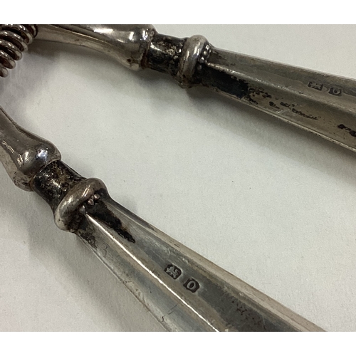 56 - A pair of silver handled glove stretchers. Birmingham. Approx. 74 grams. Est. £10 - £20.