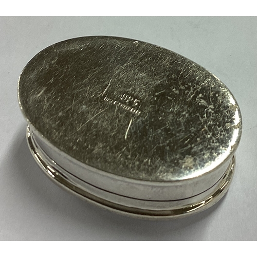 583 - An engraved silver pill box. Approx. 11 grams. Est. £20 - £30.