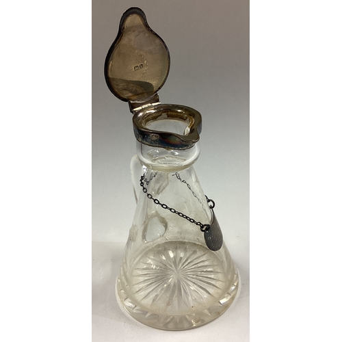 60 - A silver and glass whisky noggin with label. Birmingham 1907. Approx. 147 grams of gross weight. Est... 