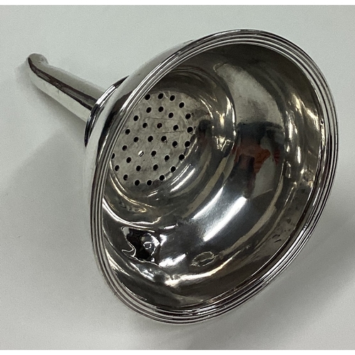 604 - DUBLIN: A 19th Century George III Irish silver wine funnel. 1805. By Matthew West. Approx. 83 grams.... 