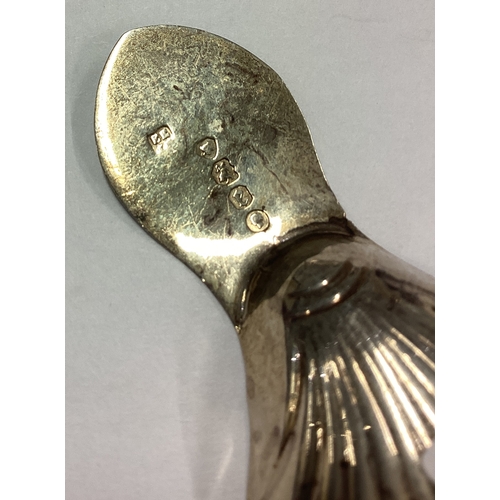 608 - A Georgian silver feather edge caddy spoon. London 1802. By Elizabeth Morley. Approx. 10 grams. Est.... 