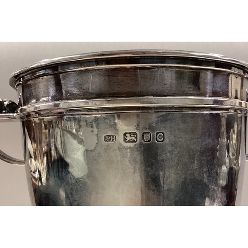 62 - GUILD OF HANDICRAFTS: A rare silver two-handled trophy cup. London 1938. Approx. 944 grams. Est. £10... 