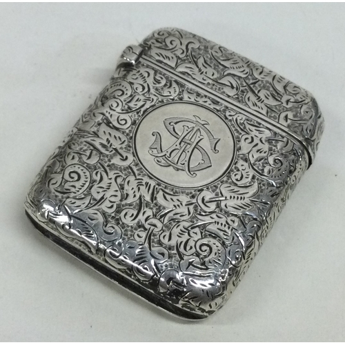 636 - A silver vesta case with engraved leaf decoration. Birmingham 1908. By Joseph Gloster. Approx. 28 gr... 