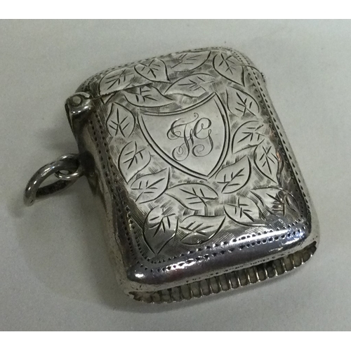 637 - A silver vesta case with engraved decoration. Approx. 23 grams. Est. £20 - £30.