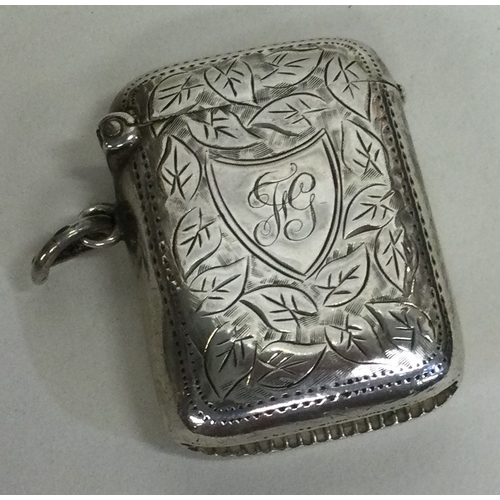 637 - A silver vesta case with engraved decoration. Approx. 23 grams. Est. £20 - £30.