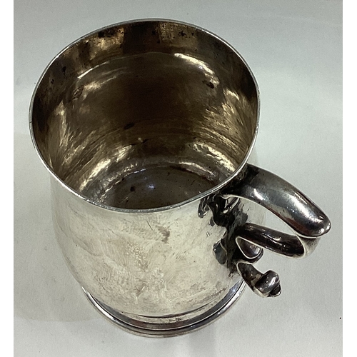 650 - An 18th Century Georgian Provincial silver mug. Maker's mark only to base. Approx. 106 grams. Est. £... 