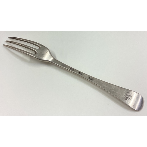 652 - An 18th Century silver three prong fork. London 1736. Approx. 63 grams. Est. £200 - £250.