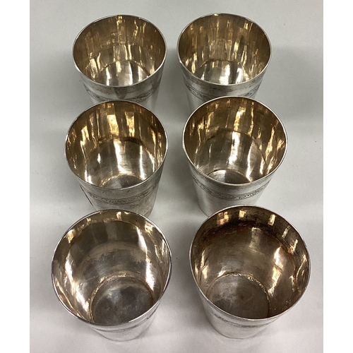 659 - A set of six Chinese silver stacking beakers. Marked to bases. Approx. 245 grams. Est. £150 - £200.