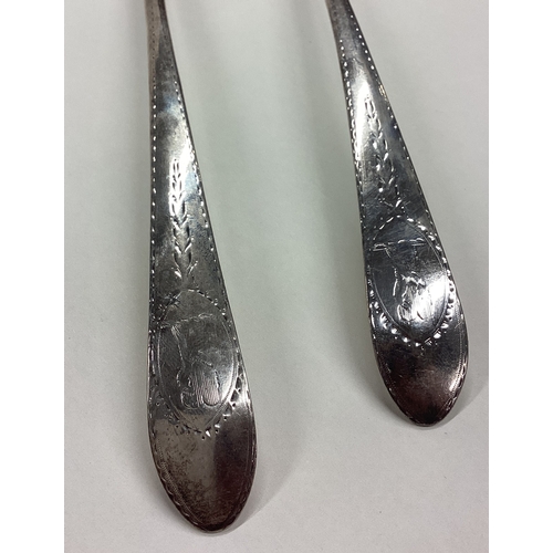 666 - DUBLIN: A pair of 19th Century Irish silver basting spoons. 1780. By IL. Approx. 200 grams. Est. £30... 