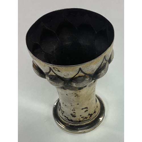 667 - An Antique German silver beaker. Approx. 66 grams. Est. £80 - £120.