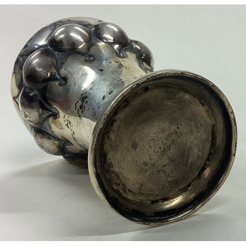 667 - An Antique German silver beaker. Approx. 66 grams. Est. £80 - £120.