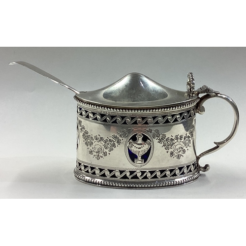 669 - An ornate pierced silver mustard pot with BGL engraved with flowers in the Neoclassical style. Londo... 