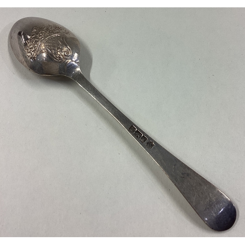 673 - A silver picture back spoon decorated with basket of flowers in the Georgian style. Sheffield 1902. ... 