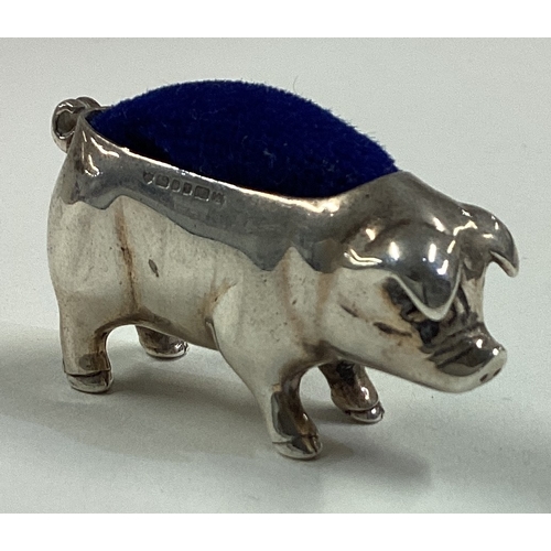 68 - A modern silver pin cushion in the form of a pig. Approx. 23 grams. Est. £40 - £60.