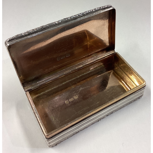 681 - A large engine turned George III silver snuff box with hinged lid. Birmingham 1830. By Edward Smith.... 