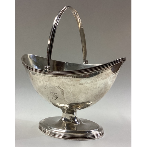 692 - An 18th Century Georgian silver swing handled basket. London 1791. By Henry Chawner. Approx. 163 gra... 