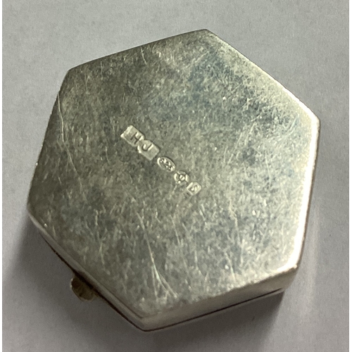 695 - A hexagonal silver pill box with engraved decoration to hinged lid. Approx. 10 grams. Est. £20 - £30... 