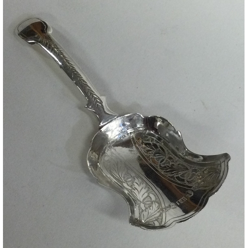 743 - A good Georgian silver bright-cut caddy spoon with leaf and vine decoration. Birmingham. Approx. 10 ... 