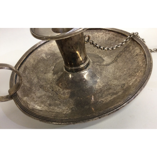 749 - A good heavy cast silver chamberstick together with matching extinguisher. Birmingham. Approx. 458 g... 