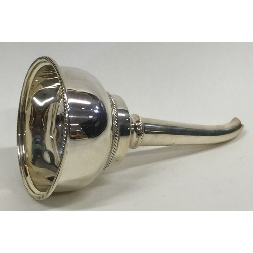 776 - A large plain silver wine funnel with shell thumbpiece in the Georgian style. Approx. 76 grams. Est.... 