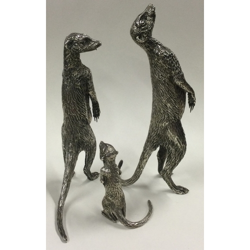 790 - PATRICK MAVROS: A fine set of three silver figures of meerkats in standing position with textured bo... 