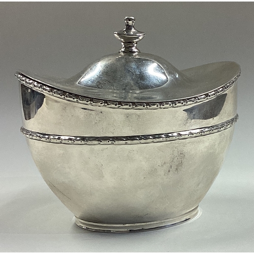 8 - A silver tea caddy / biscuit box with hinged lid. Approx. 182 grams. Est. £150 - £200.