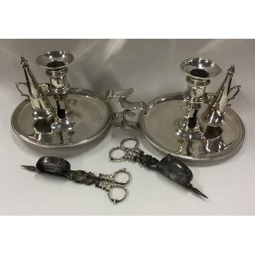 434 - A good pair of George III double crested silver chambersticks with matching snuffers and sconces. Lo... 