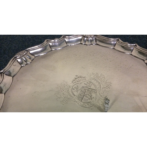 452 - A large George II silver salver with central armorial. London 1743. By Robert Abercrombie. Approx. 1... 