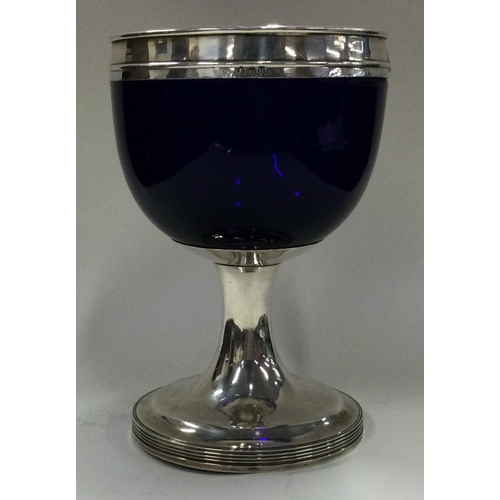 454 - An unusual silver and blue glass goblet of large proportion. By Phipps & Robinson. Approx. 303 grams... 