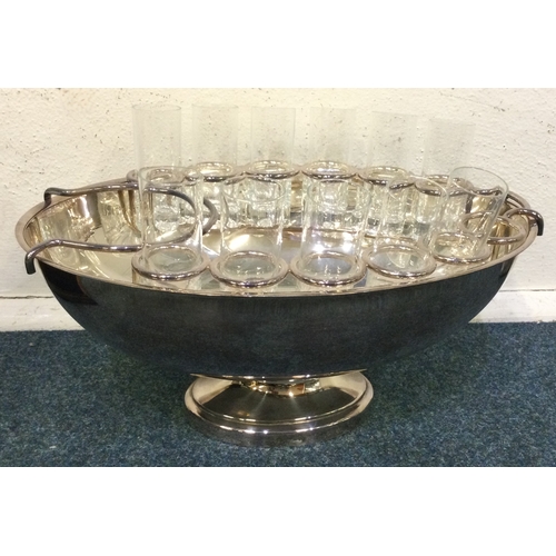 770 - A good silver plated spirit cup stand of oval form. Est. £50 - £80.