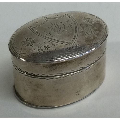 712 - A good quality oval Georgian silver hinged top nutmeg grater with shield decoration. Birmingham. By ... 