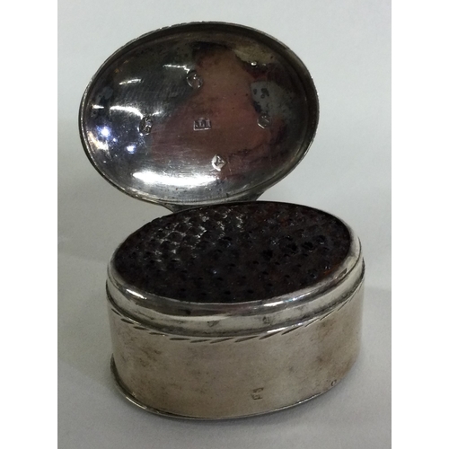 712 - A good quality oval Georgian silver hinged top nutmeg grater with shield decoration. Birmingham. By ... 