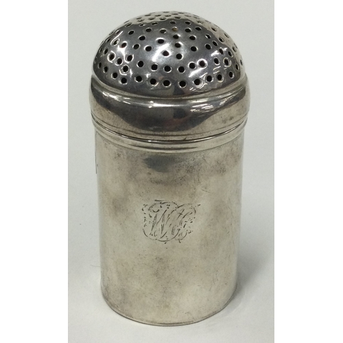 677 - A rare Provincial silver kitchen pepper. Marked to base. Approx. 50 grams. Est. £400 - £600.