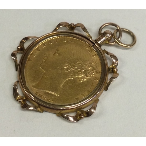 801 - An 1872 Victorian gold Sovereign in mount. Approx. 10 grams. Est. £320 - £350.