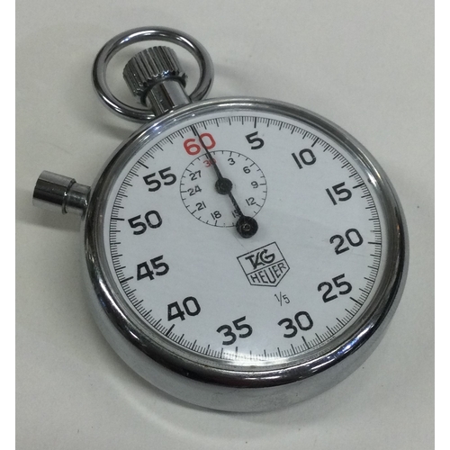 811 - TAG HEUER: A chrome stopwatch. Approx. 100 grams. Est. £50 - £80.