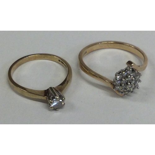 812 - A diamond five stone ring in 18 carat gold setting together with a 9 carat example. Approx. 4 grams.... 