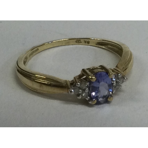 833 - A 9 carat diamond set six stone ring. Approx. 2 grams. Est. £30 - £40.