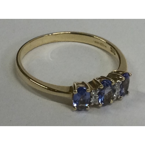 834 - A small diamond five stone ring in 14 carat gold setting. Approx. 1 gram. Est. £20 - £30.