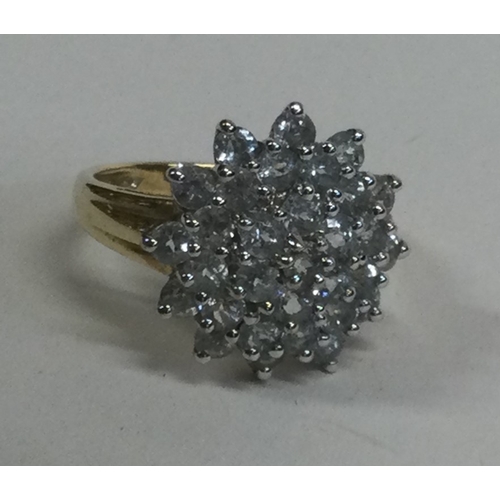 835 - A large 9 carat dress ring. Approx. 3 grams. Est. £40 - £60.