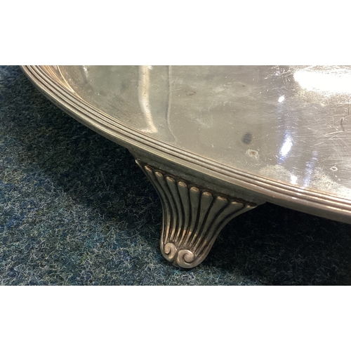 34 - A large 18th Century oval silver salver on feet. London 1798. By John Robins. Approx. 1300 grams. Es... 