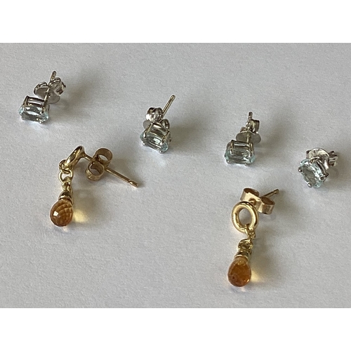 854 - A group of five pairs of 9 carat stone set earrings. Approx. 2 grams. Est. £30 - £40.