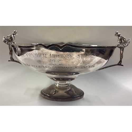 109 - An unusual silver presentation bowl cast with figural ballerina handles. Sheffield 1968. Approx. 620... 