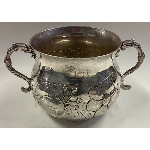 114 - A 17th Century silver porringer. Marked to base. London 1677. Approx. 135 grams. Est. £1500 - £2000.