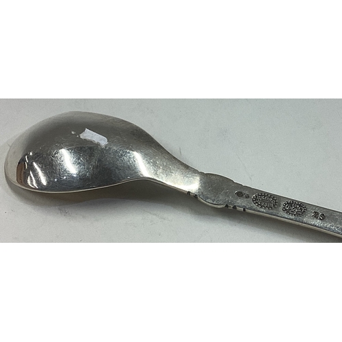 118 - GEORG JENSEN: A silver honey spoon. Approx. 13 grams. Est. £30 - £40.