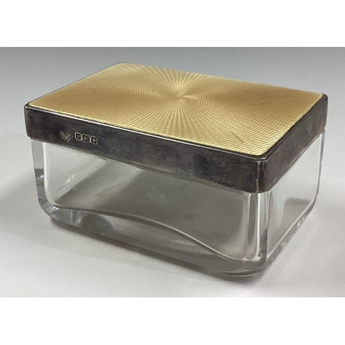 140 - A silver, yellow enamelled and glass box. London  1937. Est. £80 - £120.