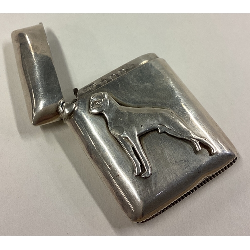 145 - An unusual silver hinged top vesta case mounted with a Boxer dog. Birmingham. Approx. 13 grams. Est.... 