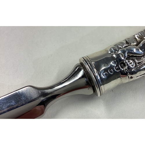 159 - A large silver mounted letter opener cast with figural handle. London. Approx. 74 grams. Est. £20 - ... 