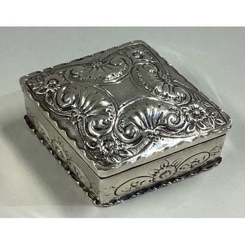 169 - A diamond-shaped chased silver snuff box embossed with floral decoration. Birmingham 1891. By Deakin... 